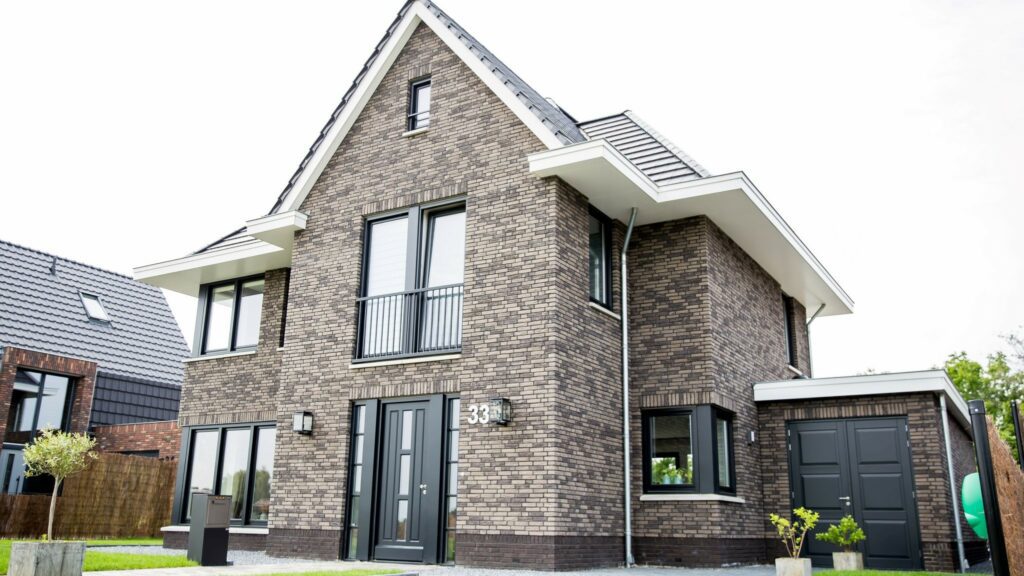 Jaren 30 woning bouwen voorzijde vliervlinder architectuurwonen